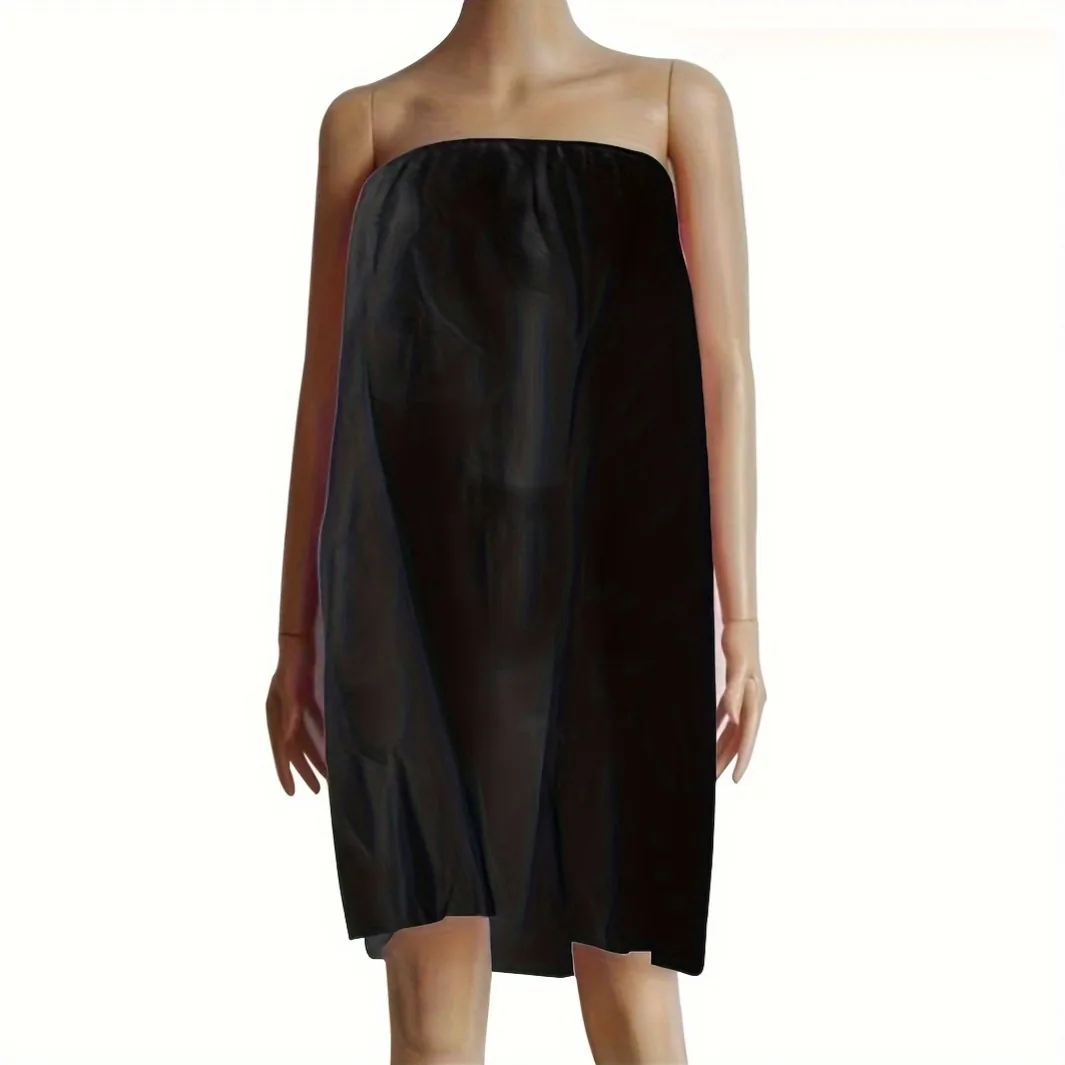 Black disposable non-woven bathrobe worn by model for spa and beauty salon wholesale