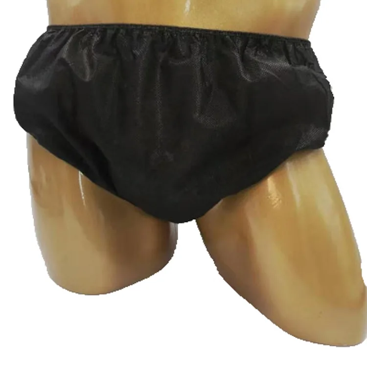Black disposable non-woven underwear for spa salon, single use design, worn on mannequin